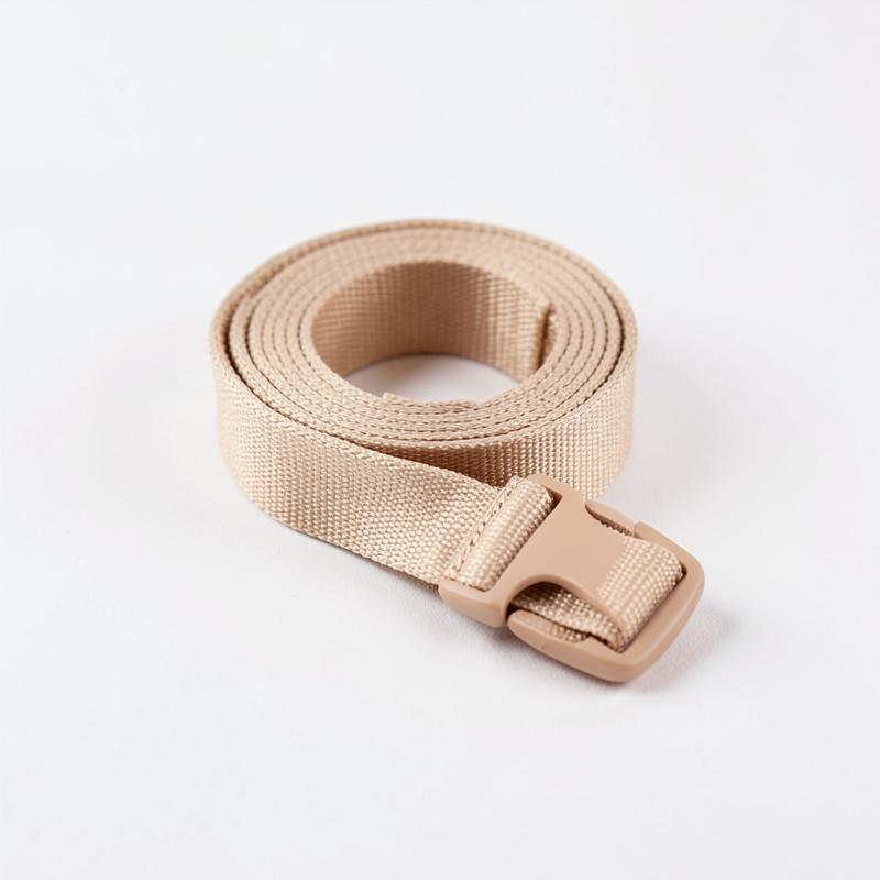 Sand-beige adjustable luggage strap with a buckle